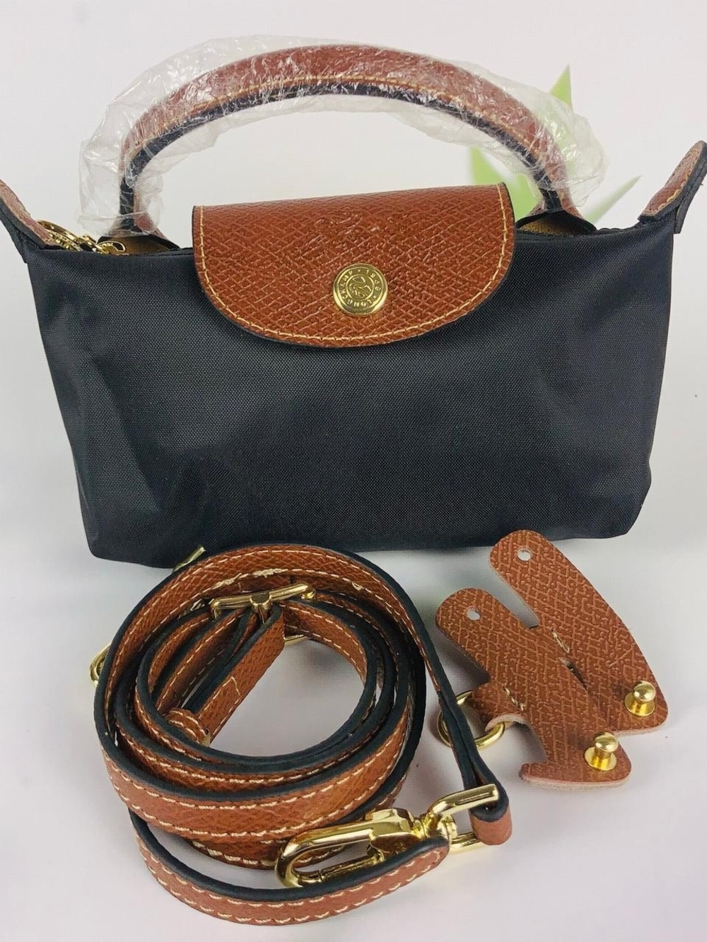 Black Nylon Crossbody Bag with Brown Leather Trim and Gold Accent